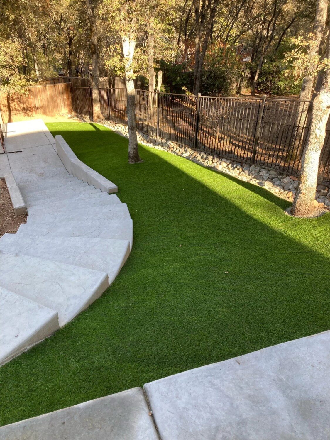 Tuscany 54 oz Backyard with Stone Border — Always Green Tuscany 54 oz installed by USA Home Improvement